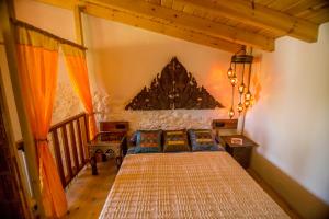 Posteľ alebo postele v izbe v ubytovaní Casa con encanto en Alájar- El Bosque mágico de Alájar