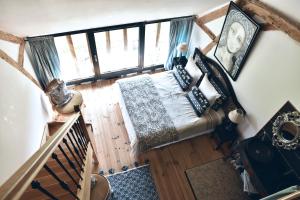 an overhead view of a bedroom with a bed at Château de Clermont in Clermont-les-Fermes