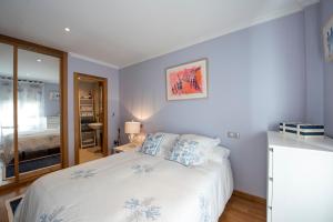 Ένα ή περισσότερα κρεβάτια σε δωμάτιο στο OH LA LIFE! PORTOSIN