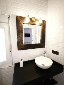 Koupelna v ubytování Rua Suites Boutique