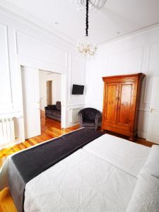 Postel nebo postele na pokoji v ubytování Rua Suites Boutique