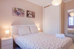 Posteľ alebo postele v izbe v ubytovaní Beach and golf apartament