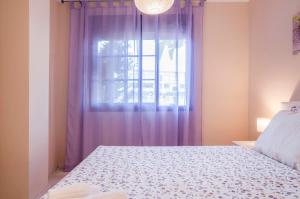 Posteľ alebo postele v izbe v ubytovaní Beach and golf apartament