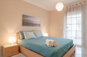 Posteľ alebo postele v izbe v ubytovaní Beach and golf apartament