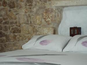 Postel nebo postele na pokoji v ubytování Elda Guest House