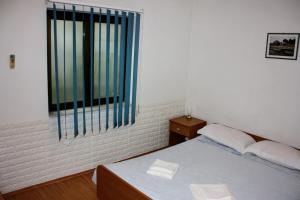 Guesthouse Santor客房内的一张或多张床位