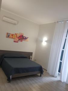 Postel nebo postele na pokoji v ubytování B&b ONE
