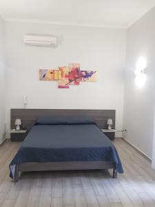 Postel nebo postele na pokoji v ubytování B&b ONE