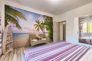 a bedroom with a view of the beach at Apartment Amfiteatar Moris in Pula