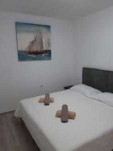 Postel nebo postele na pokoji v ubytování Apartman Noah + 31 fotografií
