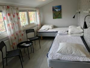Postel nebo postele na pokoji v ubytování STF Malmfältens Folkhögskola