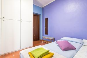 Giường trong phòng chung tại Gangdigiorgia