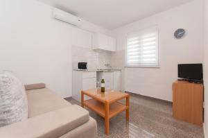 Kuchyň nebo kuchyňský kout v ubytování Apartmani Vesna