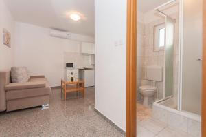 Koupelna v ubytování Apartmani Vesna + 37 fotografií