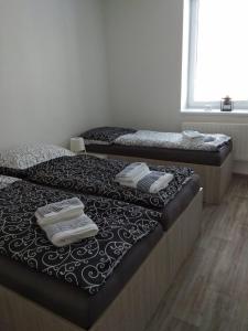 Voodi või voodid majutusasutuse Apartmány U splavu toas