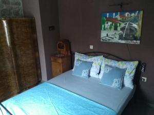 Кровать или кровати в номере Apartment BUGA