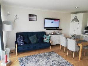 Kuchyň nebo kuchyňský kout v ubytování Apartament na Morskim Wzgórzu