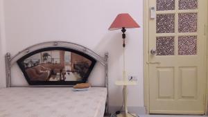Postel nebo postele na pokoji v ubytování Homestay Nam Dong
