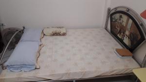 Postel nebo postele na pokoji v ubytování Homestay Nam Dong