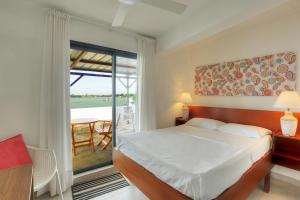 Postel nebo postele na pokoji v ubytování Auberge SeaFever