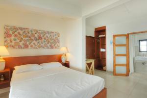 Postel nebo postele na pokoji v ubytování Auberge SeaFever