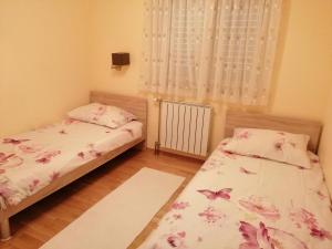 Postel nebo postele na pokoji v ubytování Apartment Markorcula