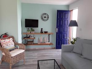 Casita La Finca I的电视和/或娱乐中心