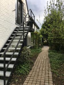 a set of stairs next to a building at La dreve in Verviers