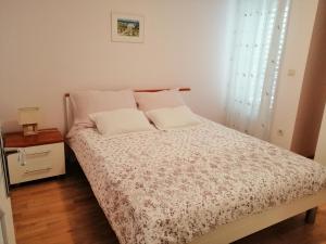 Postel nebo postele na pokoji v ubytování Apartment Markorcula