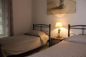 A bed or beds in a room at Blue Island