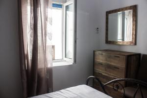 A bed or beds in a room at Blue Island