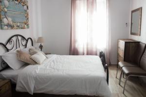 A bed or beds in a room at Blue Island