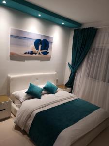 Postel nebo postele na pokoji v ubytování Kariat Cabo - Appartement Charmant, Climatisé avec Vue Piscine