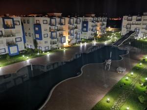 Bazén v ubytování Kariat Cabo - Appartement Charmant, Climatisé avec Vue Piscine nebo v jeho okolí