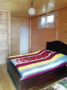 Ένα ή περισσότερα κρεβάτια σε δωμάτιο στο Guest House Ilia