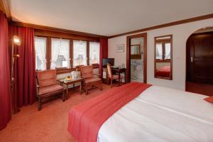 Postel nebo postele na pokoji v ubytování Hotel Astoria
