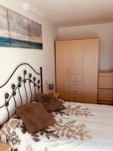 Ein Bett oder Betten in einem Zimmer der Unterkunft Apartamento Solmar
