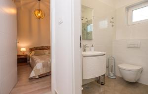 Koupelna v ubytování Apartments Kekel + 31 fotografií