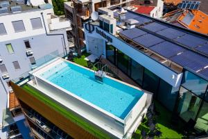 Bazén v ubytování Hotel Fagus by Aycon nebo v jeho okolí