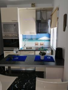 A kitchen or kitchenette at TOTANI LUX