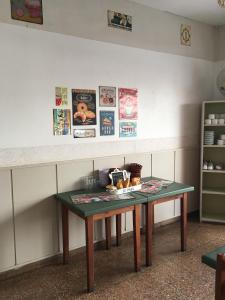 a table with some food on it in a room at Las Heras Hotel in Mar del Plata