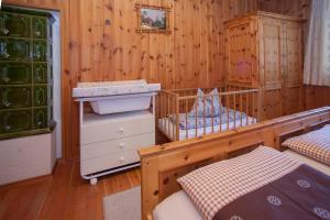 Rúm í herbergi á Gasserhütte