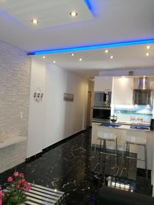 A kitchen or kitchenette at TOTANI LUX