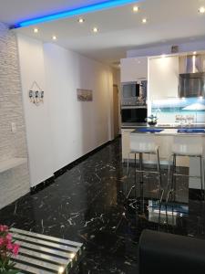 A kitchen or kitchenette at TOTANI LUX