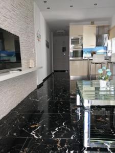 A kitchen or kitchenette at TOTANI LUX