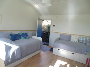 Ένα ή περισσότερα κρεβάτια σε δωμάτιο στο CABAÑA LOS QUELTEHUE