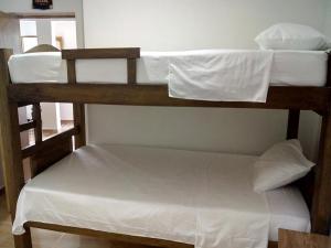 Postel nebo postele na pokoji v ubytování Hostal Casa de Barajas