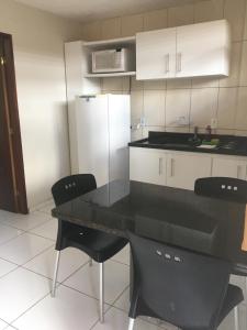 Una cocina o zona de cocina en Coco Verde Flats Natal