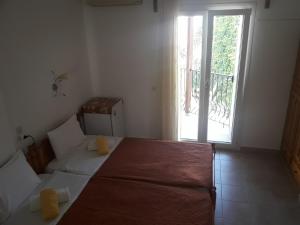 Postel nebo postele na pokoji v ubytování Pension Nikolas