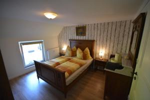 Sieben-Berge-Haus tesisinde bir odada yatak veya yataklar